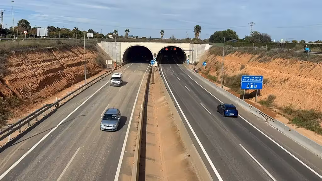 Vehicles travel beside the tunnel entrances at Pilar de la Horadada